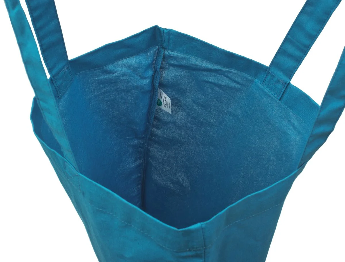 Bomuldspose, 140 g/m², inderside med etiket – lyseblå