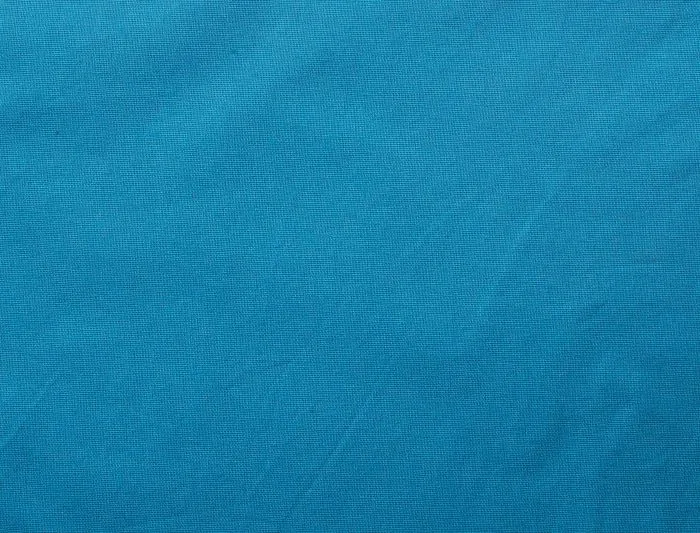 Bomuldspose, 140 g/m², nærbillede af stoffet – lyseblå