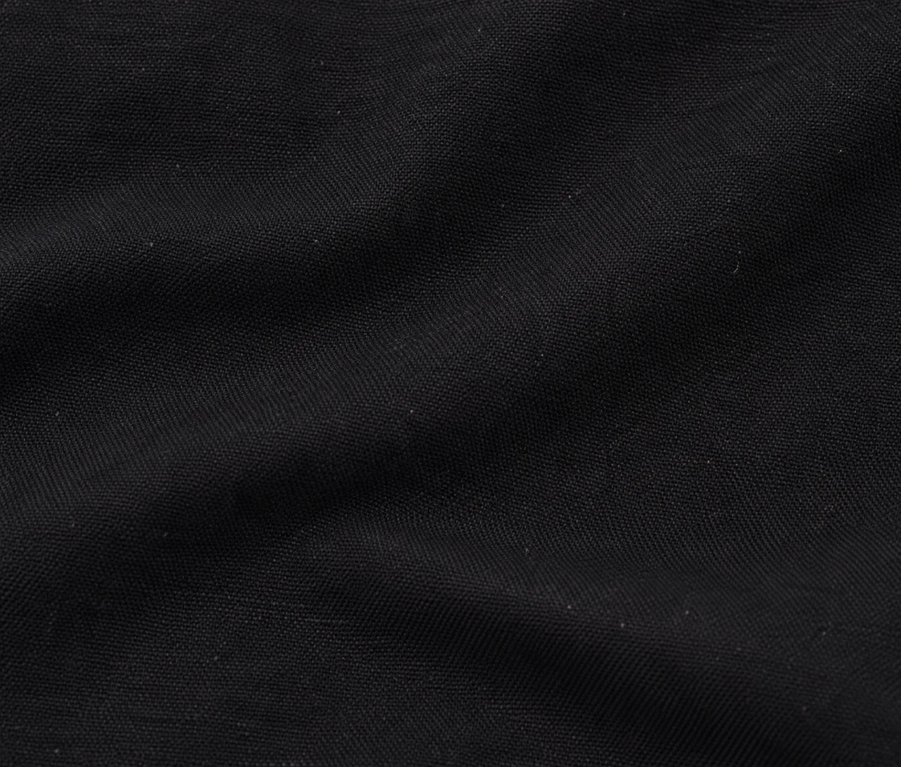 Økologisk bomuldspose, 40 × 40 cm, nærbillede af stoffets struktur – sort